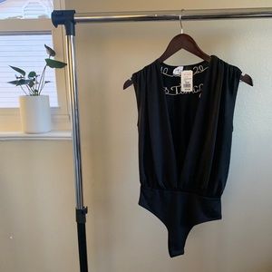 Deep V bodysuit - never worn